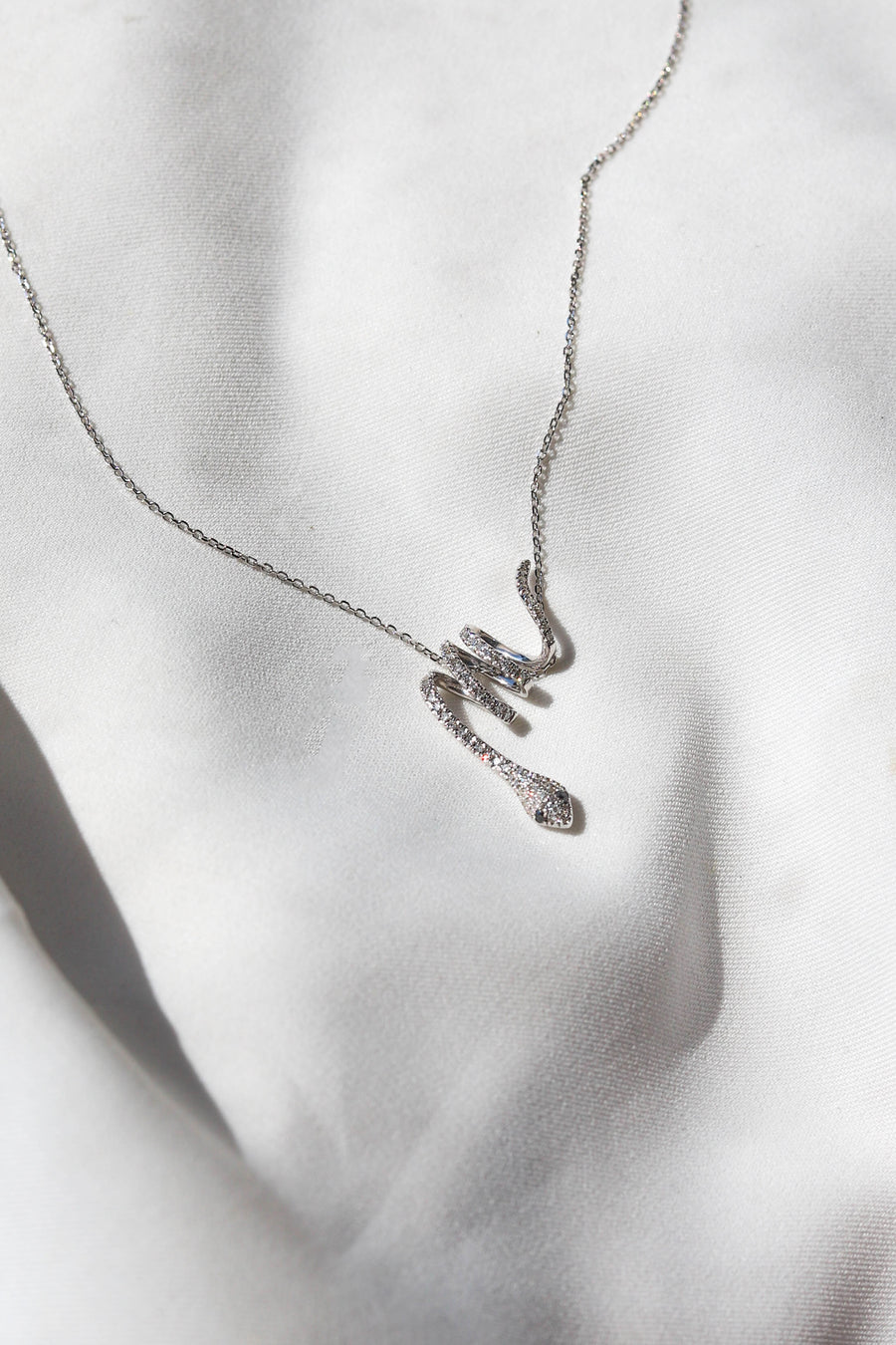 BLACK DIAMOND SNAKE PENDANT + CHAIN