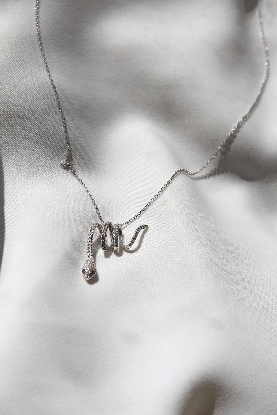 BLACK DIAMOND SNAKE PENDANT + CHAIN