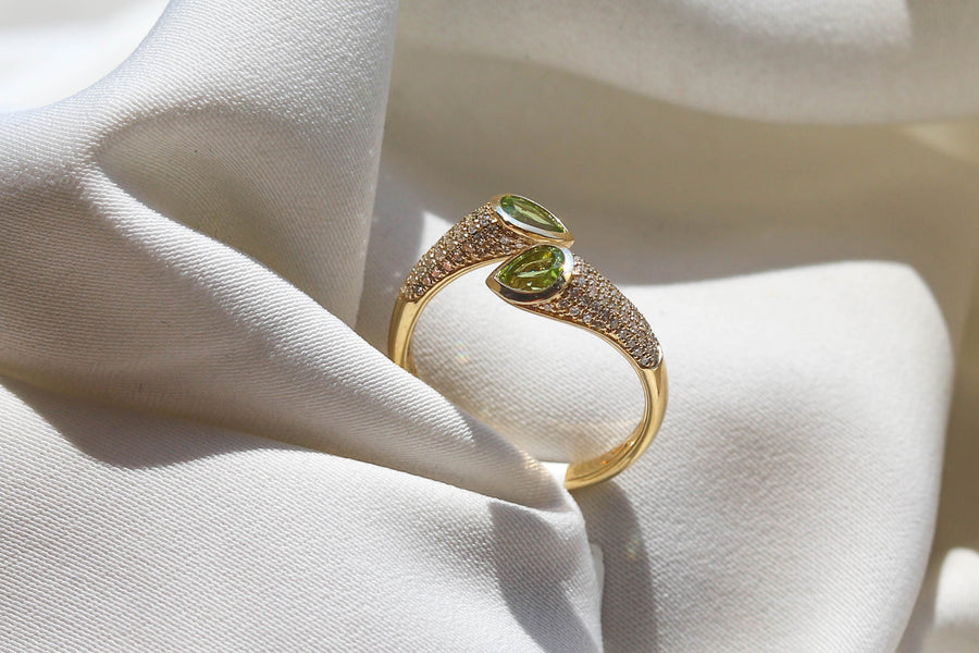 TWO STONE PERIDOT RING