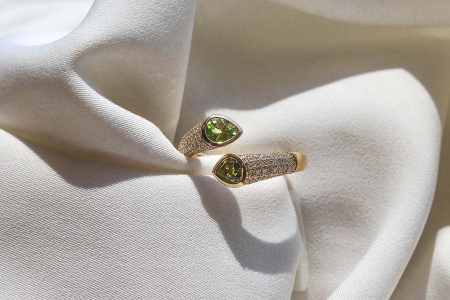 TWO STONE PERIDOT RING